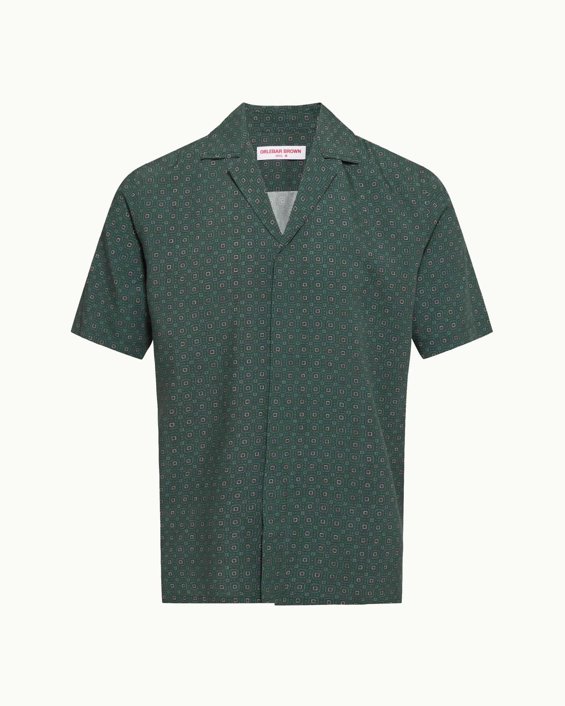 Green patterned shirt on a white background