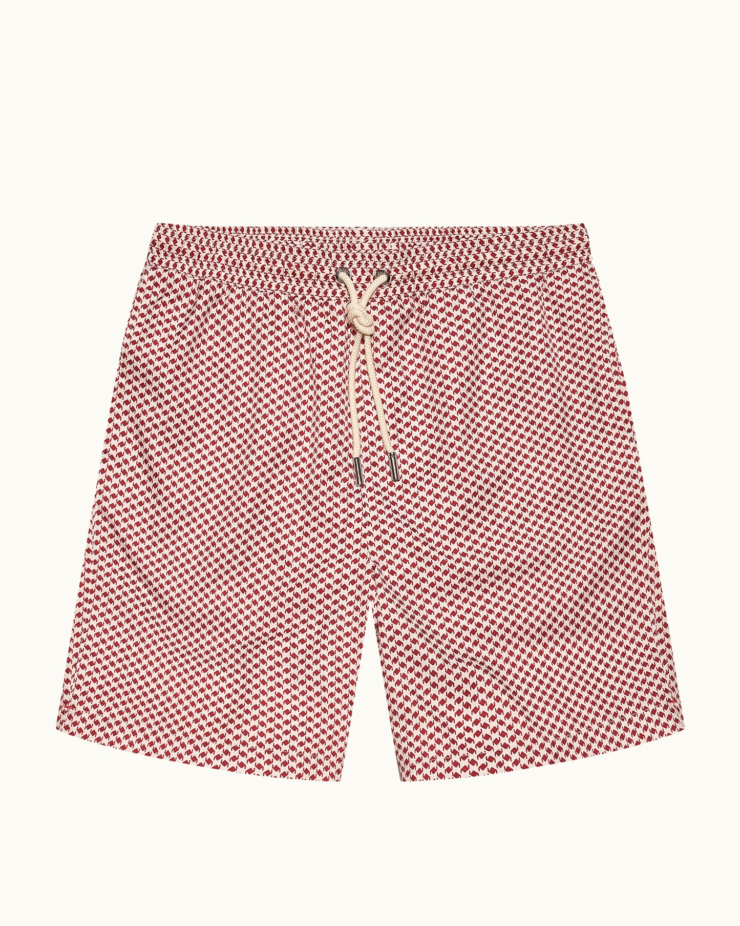 Red patterned shorts with a drawstring on a white background