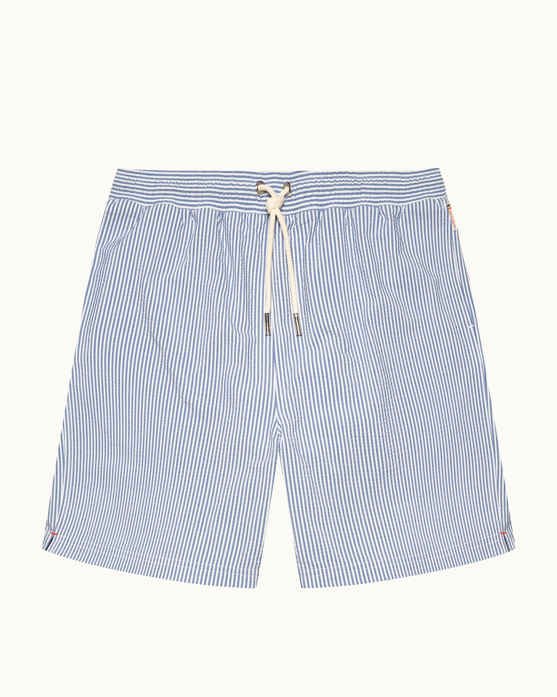 Blue and white striped shorts with a drawstring on a light gray background