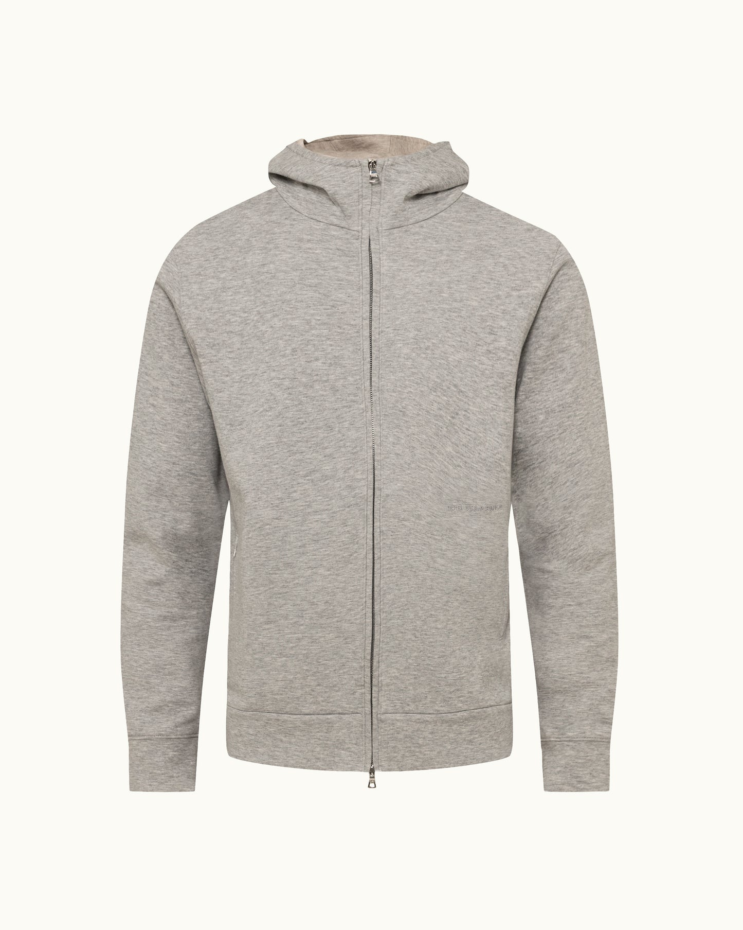 A light gray heather zip-up hoodie with a full front zipper, hood, and ribbed cuffs and hem, shown on a plain off-white background.