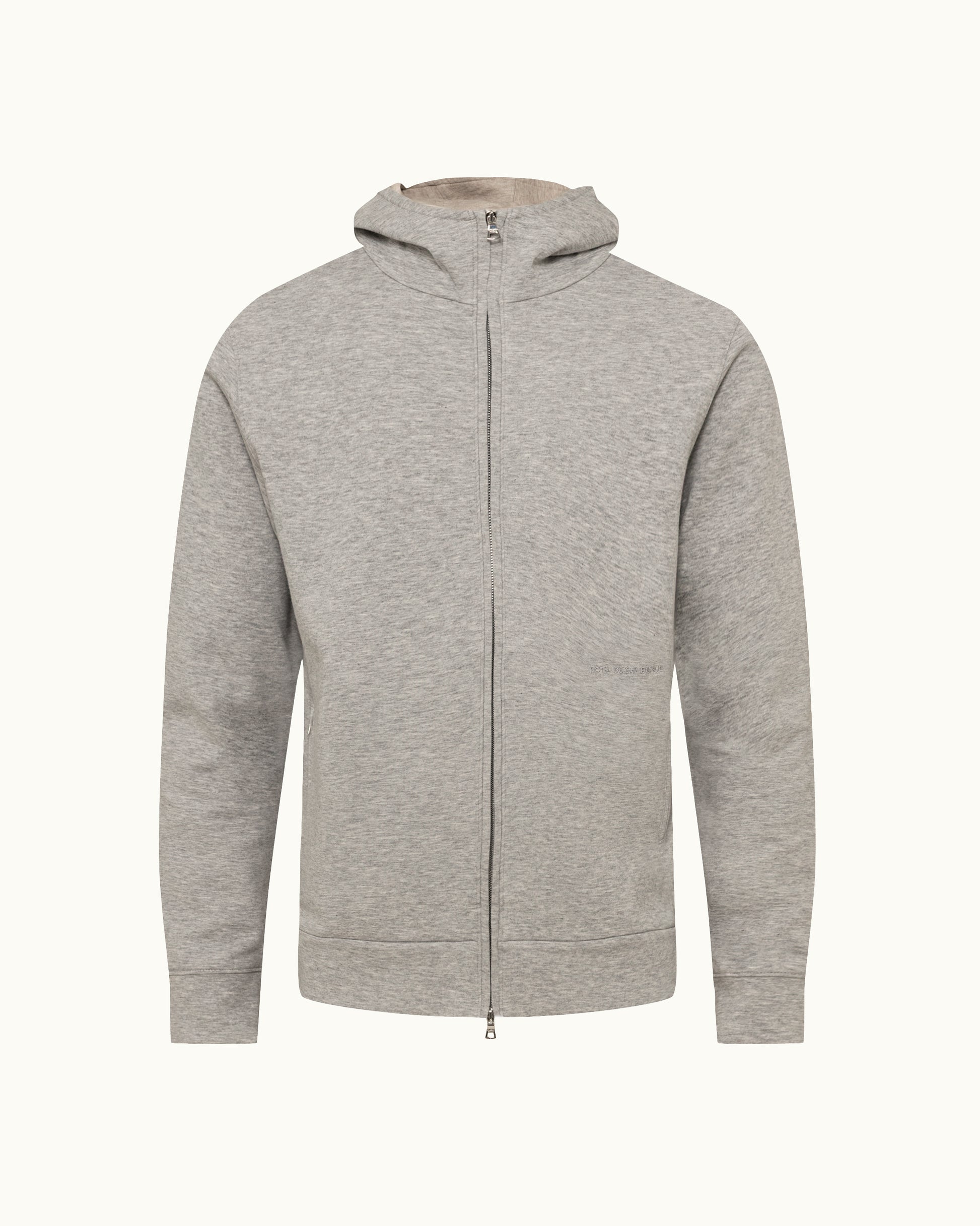 A light gray heather zip-up hoodie with a full front zipper, hood, and ribbed cuffs and hem, shown on a plain off-white background.