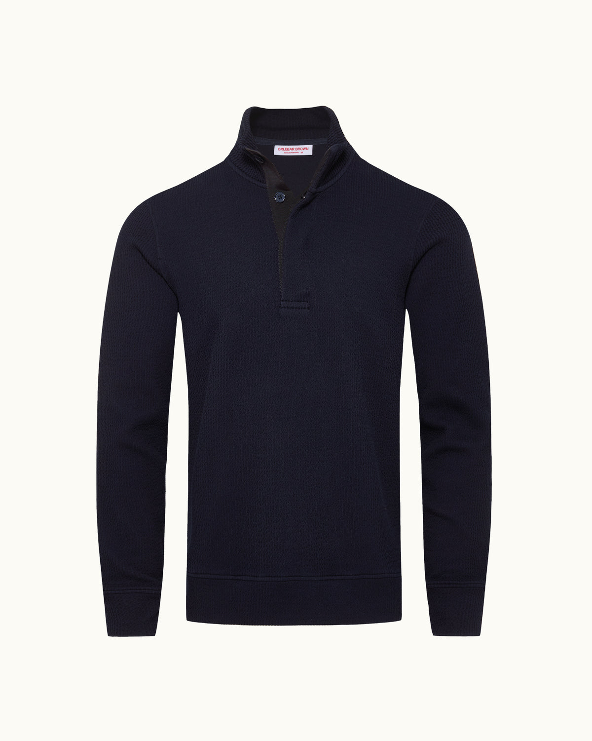 Navy high neck sweatshirt with button detailing on a plain background