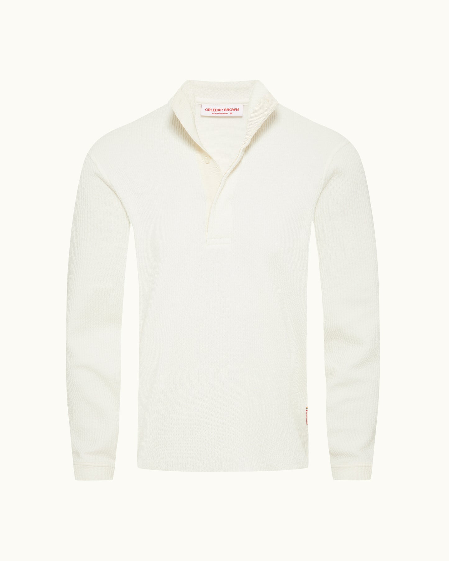 White textured long sleeve polo shirt on a plain background