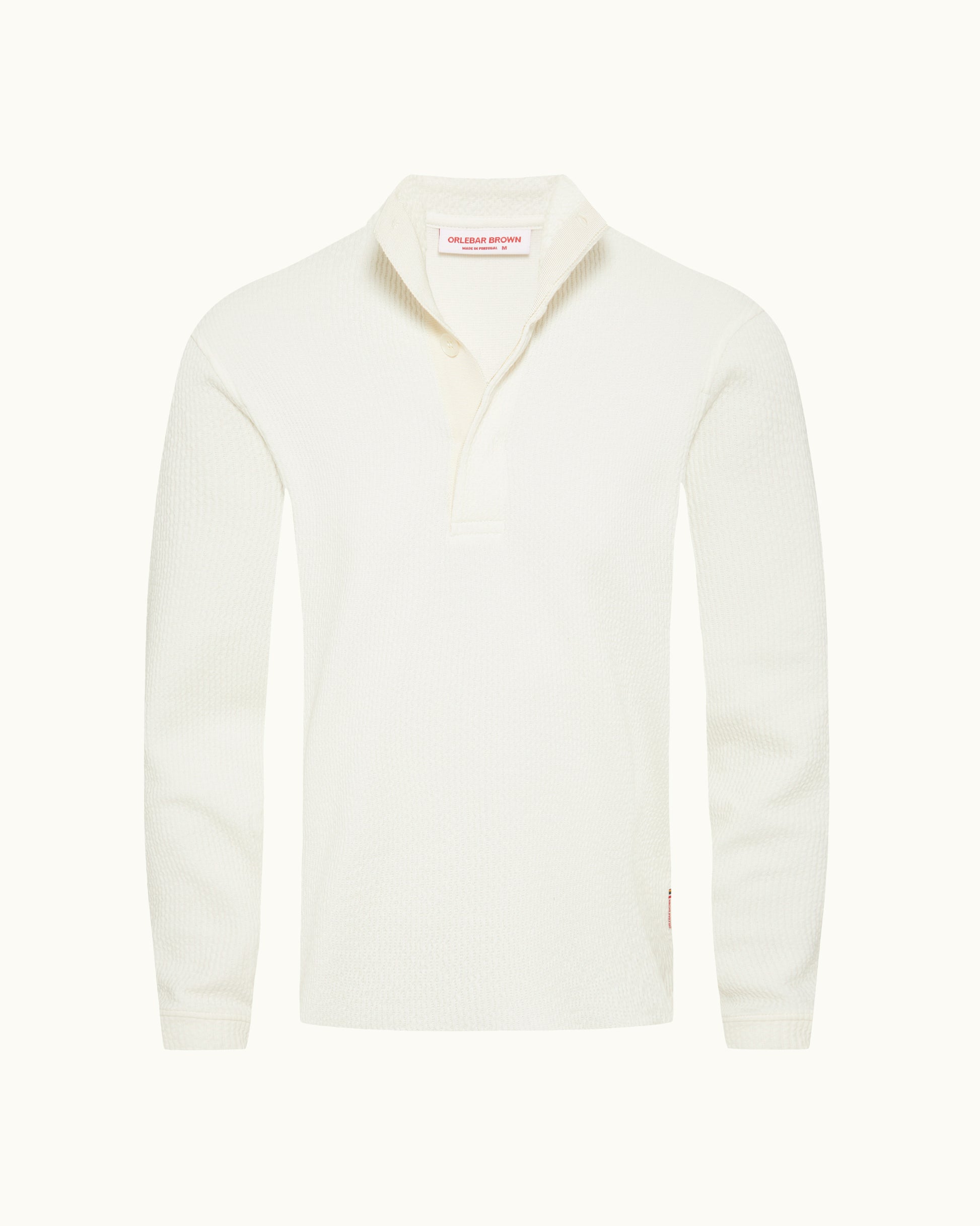 White textured long sleeve polo shirt on a plain background