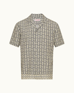 Printed beige shirt on a plain background 