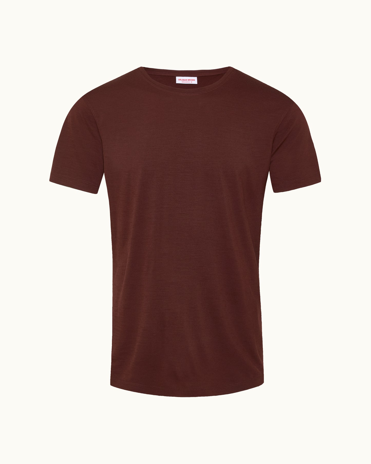 A classic short-sleeve crewneck t-shirt in a deep burgundy brown, displayed on a clean, solid off-white background.