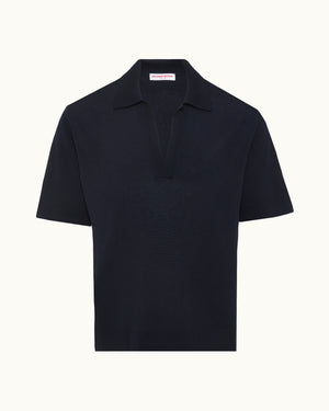 Black polo shirt on a white background