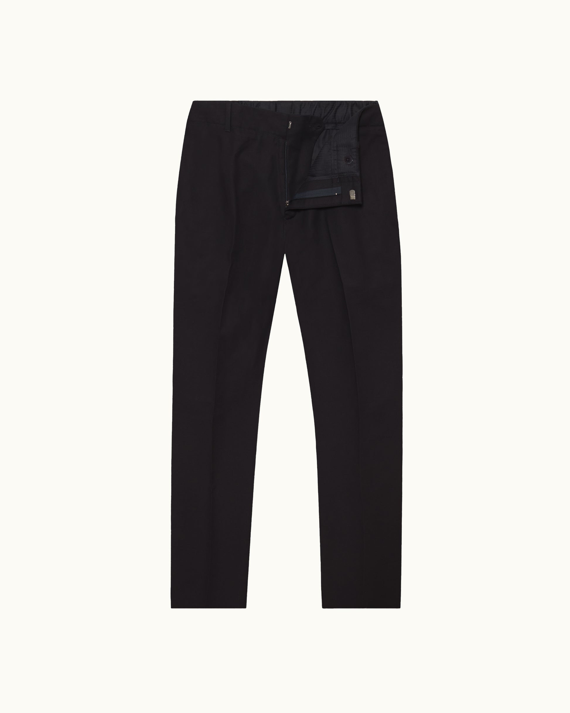 Black slim-fit trousers with a zippered pocket on the left thigh, shown flat against a light off-white background.