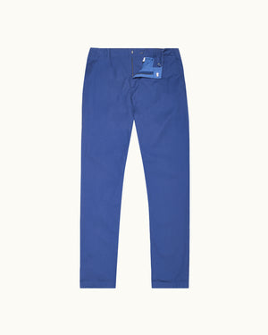 Blue pants with a tag on a white background