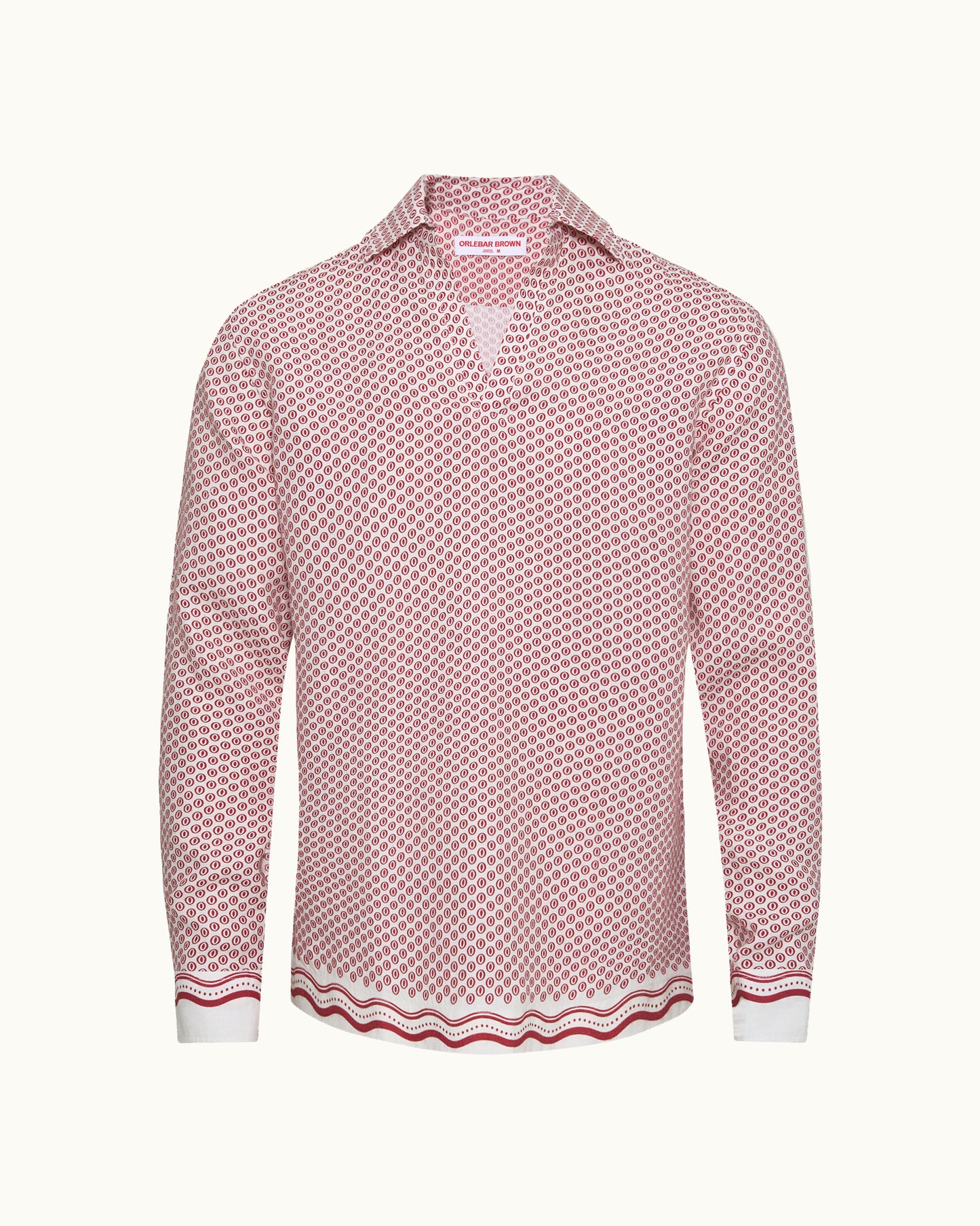 A long-sleeve button-up shirt with a pink and white geometric pattern, featuring a V-neckline, pointed collar, and a wavy striped border at the hem and cuffs.