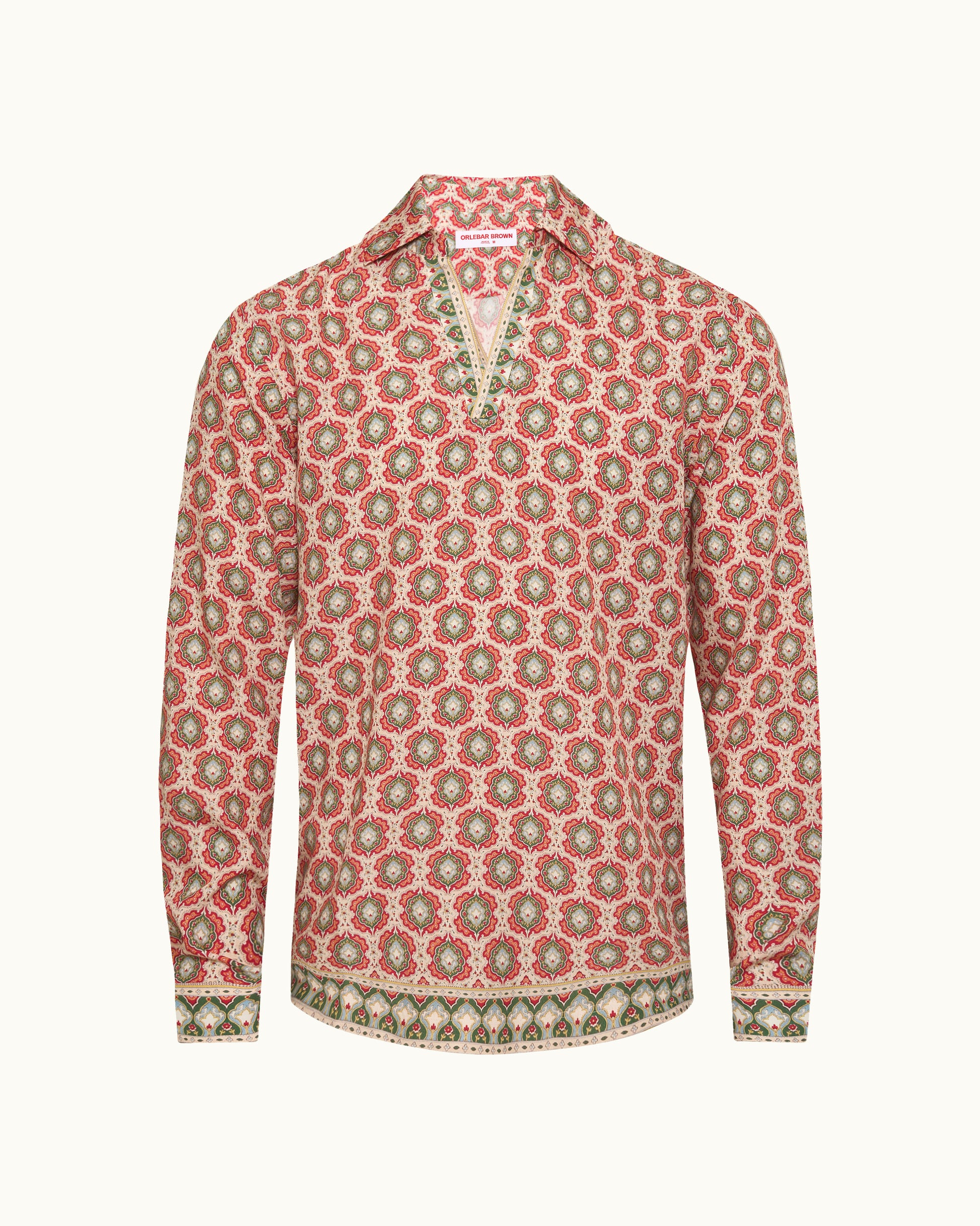 Red and green patterned shirt on a white background