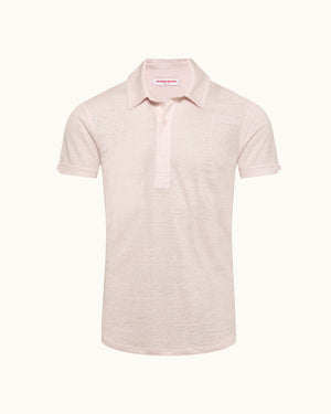 Pink polo shirt on a white background