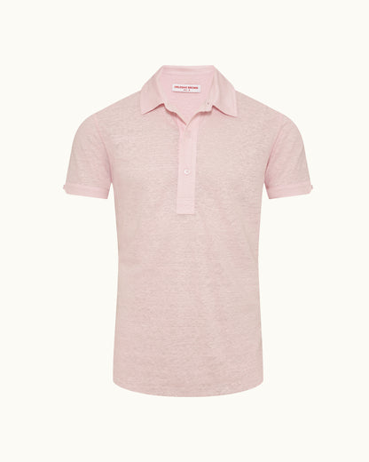 Pink polo shirt on a white background