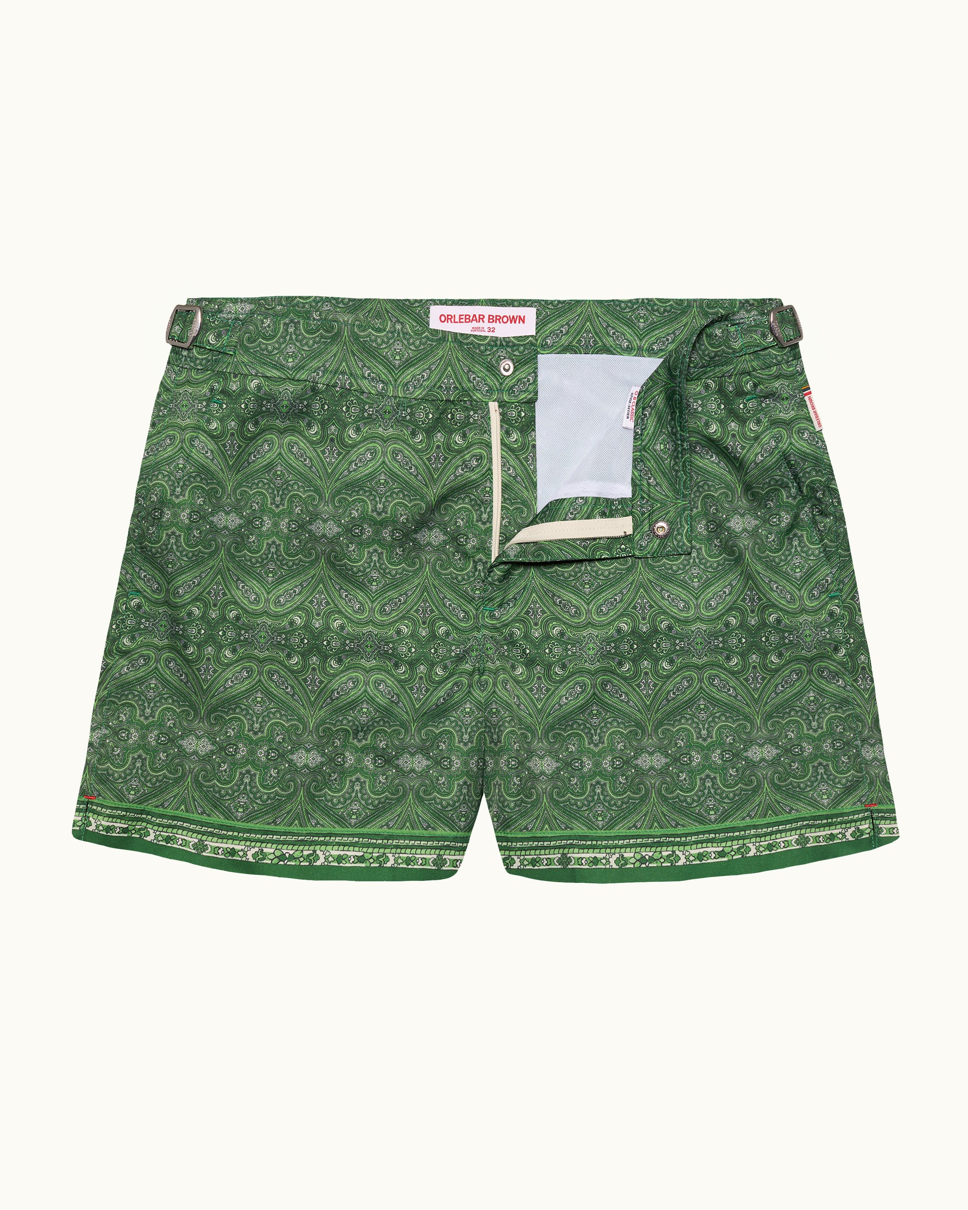 Green patterned shorts on a white background