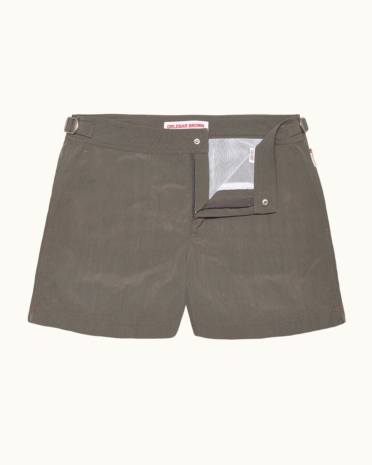 Grey shorts with a visible brand label on a white background