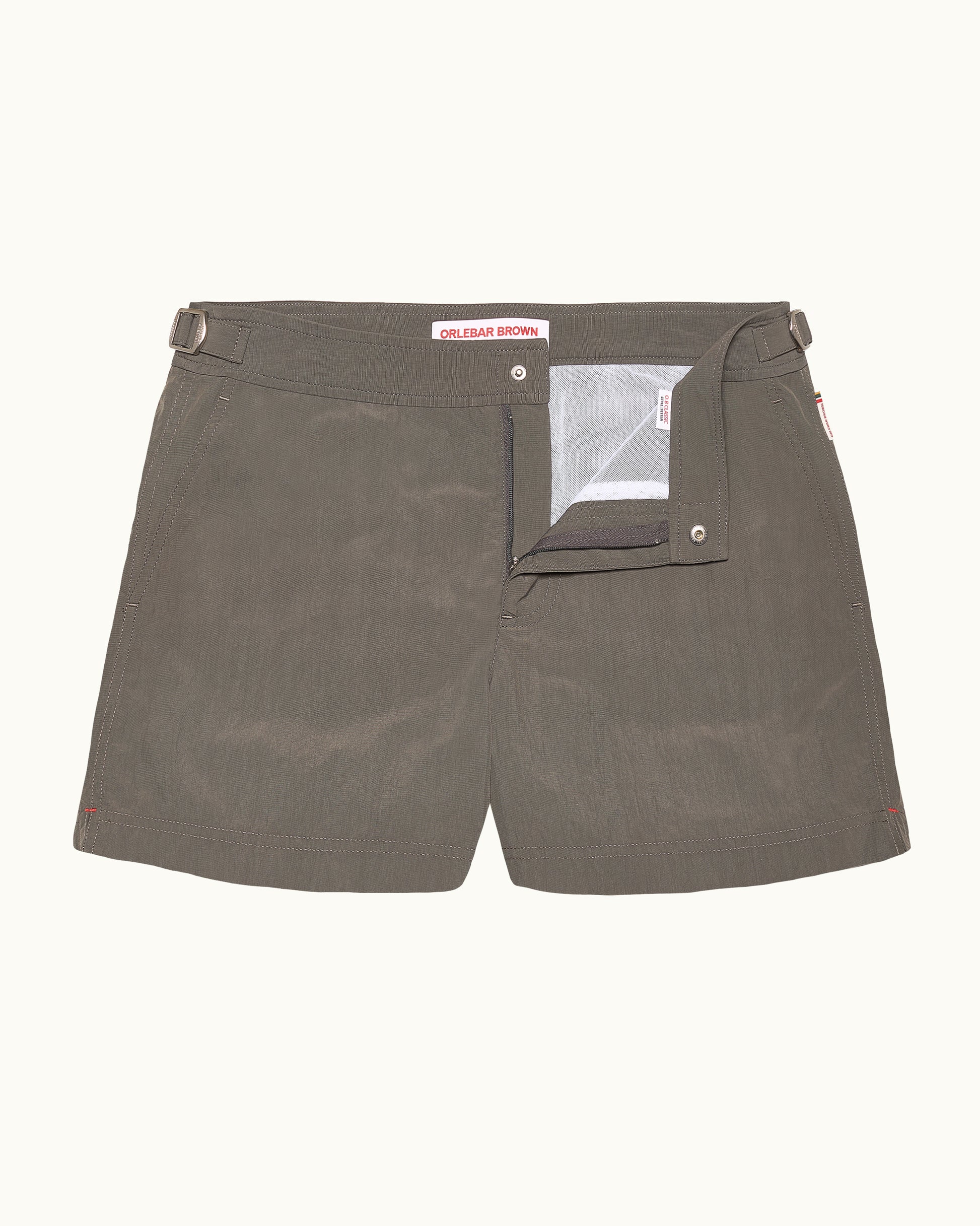 Grey shorts with a visible brand label on a white background