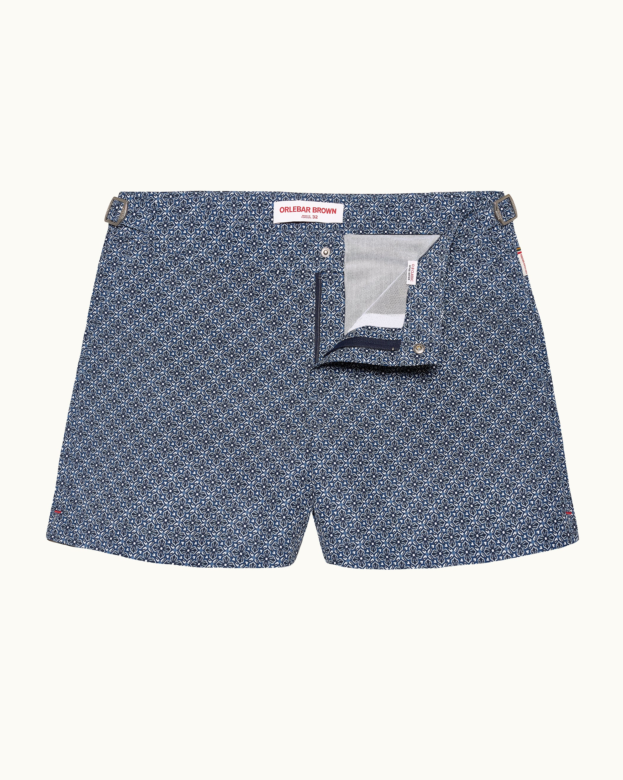 Blue patterned shorts on a white background