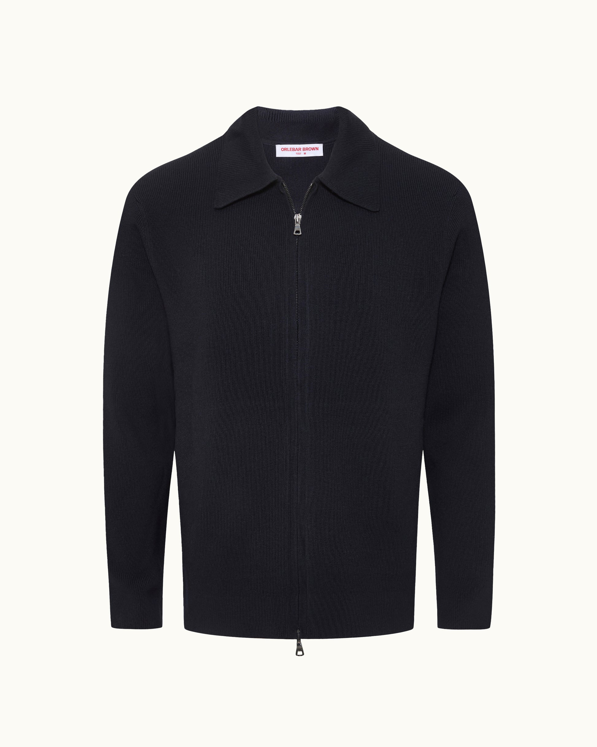 A black ribbed knit zip-up sweater with a collar, displayed on a clean off-white background.