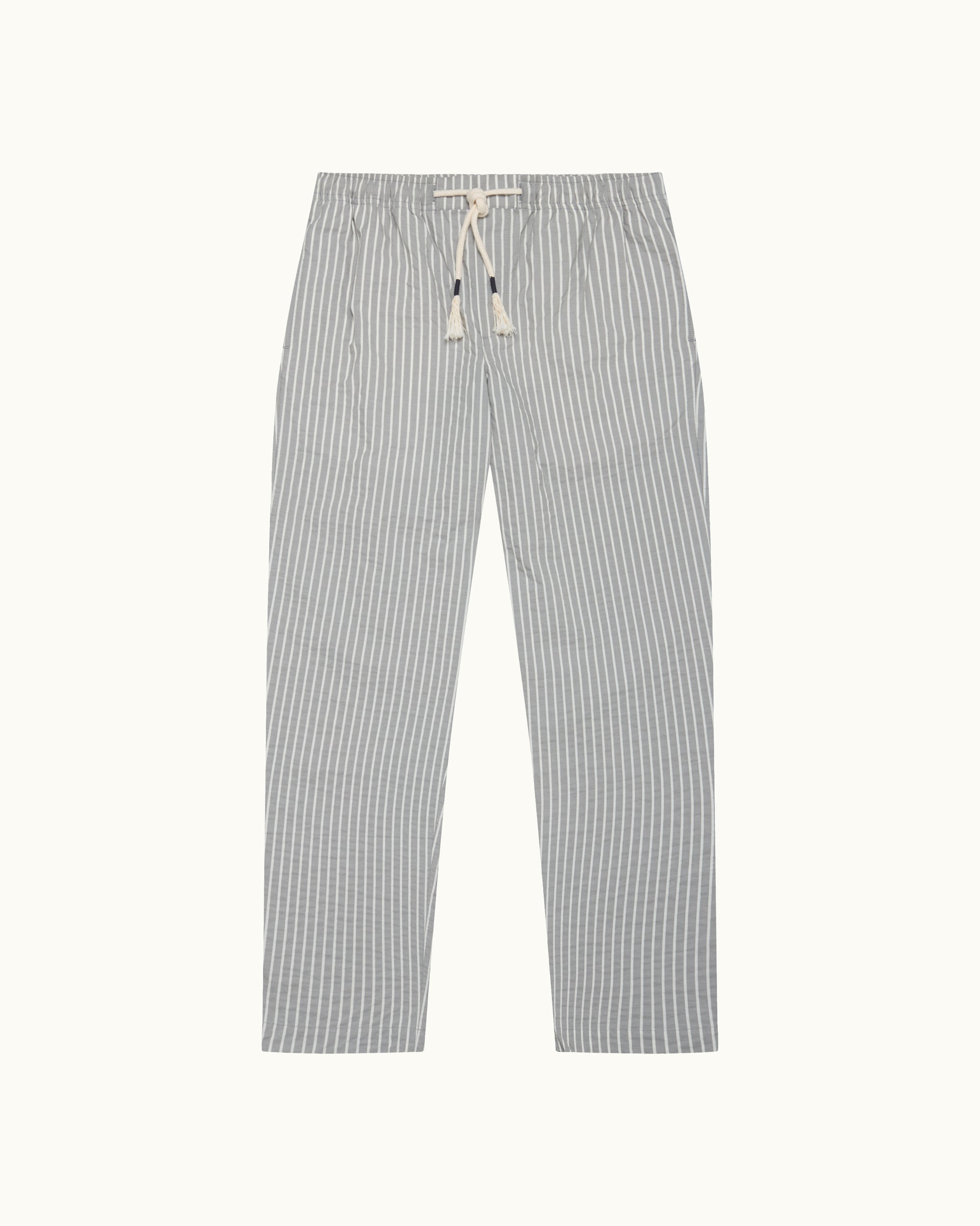Light grey trousers with light stripe and drawstring waist on a plain background