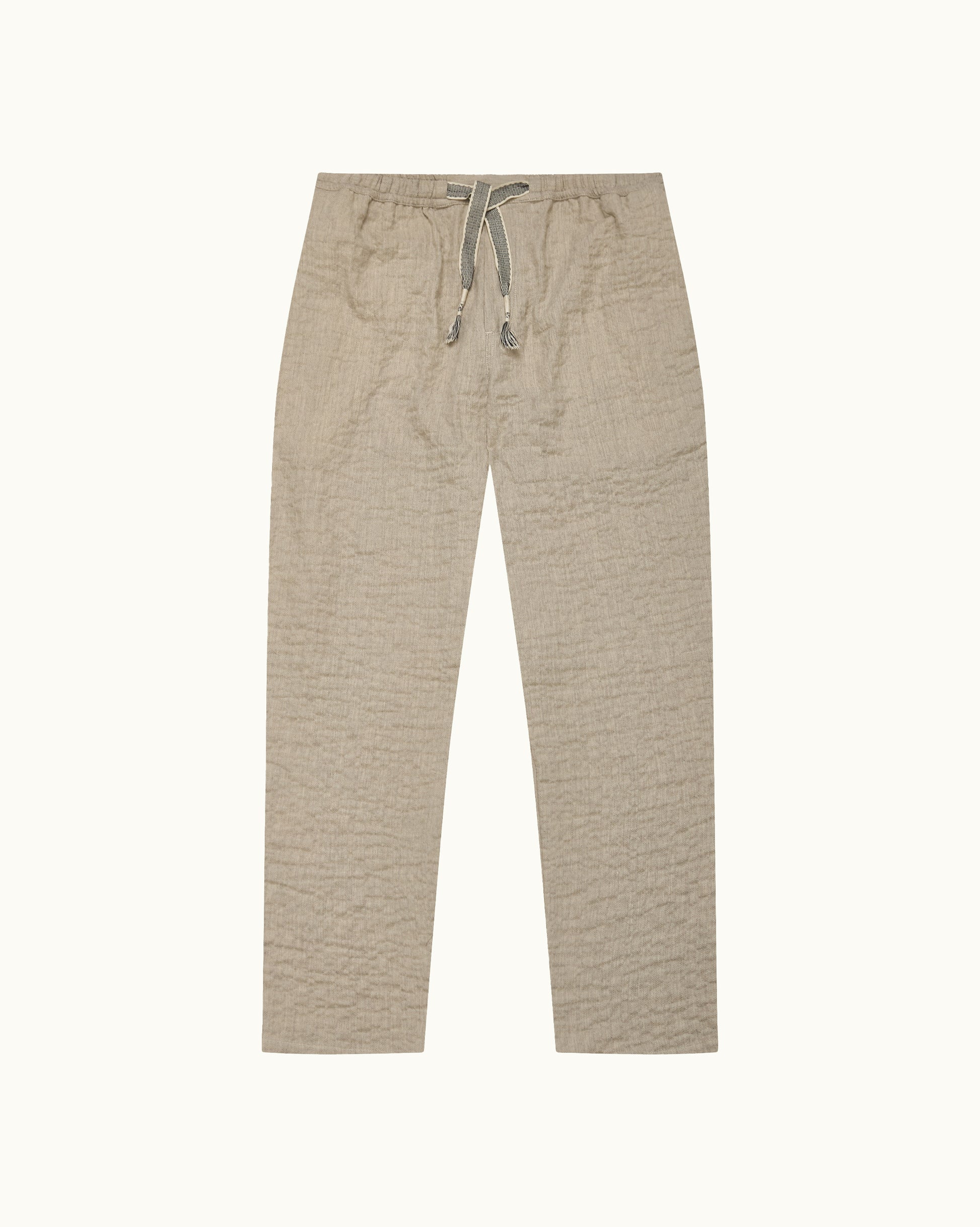 Beige pants with drawstring on a white background