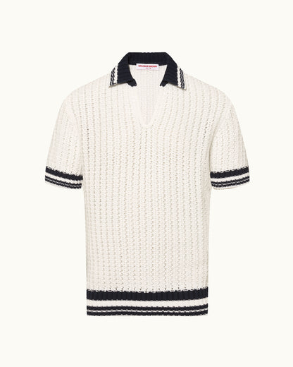 White knitted polo shirt with black trim on a white background
