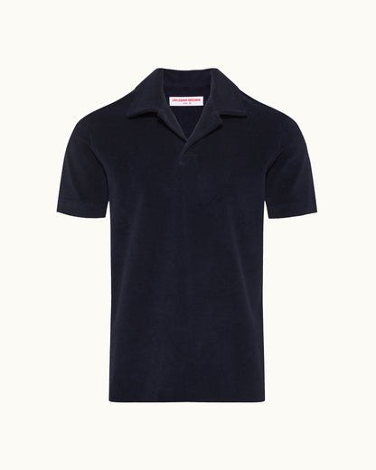 Navy blue polo shirt on a white background