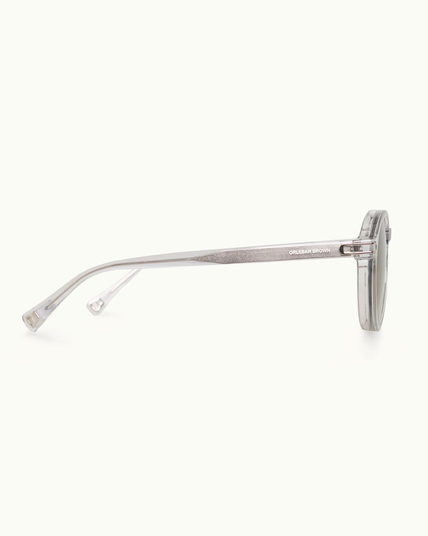 Silver sunglasses with a thin frame on a white background