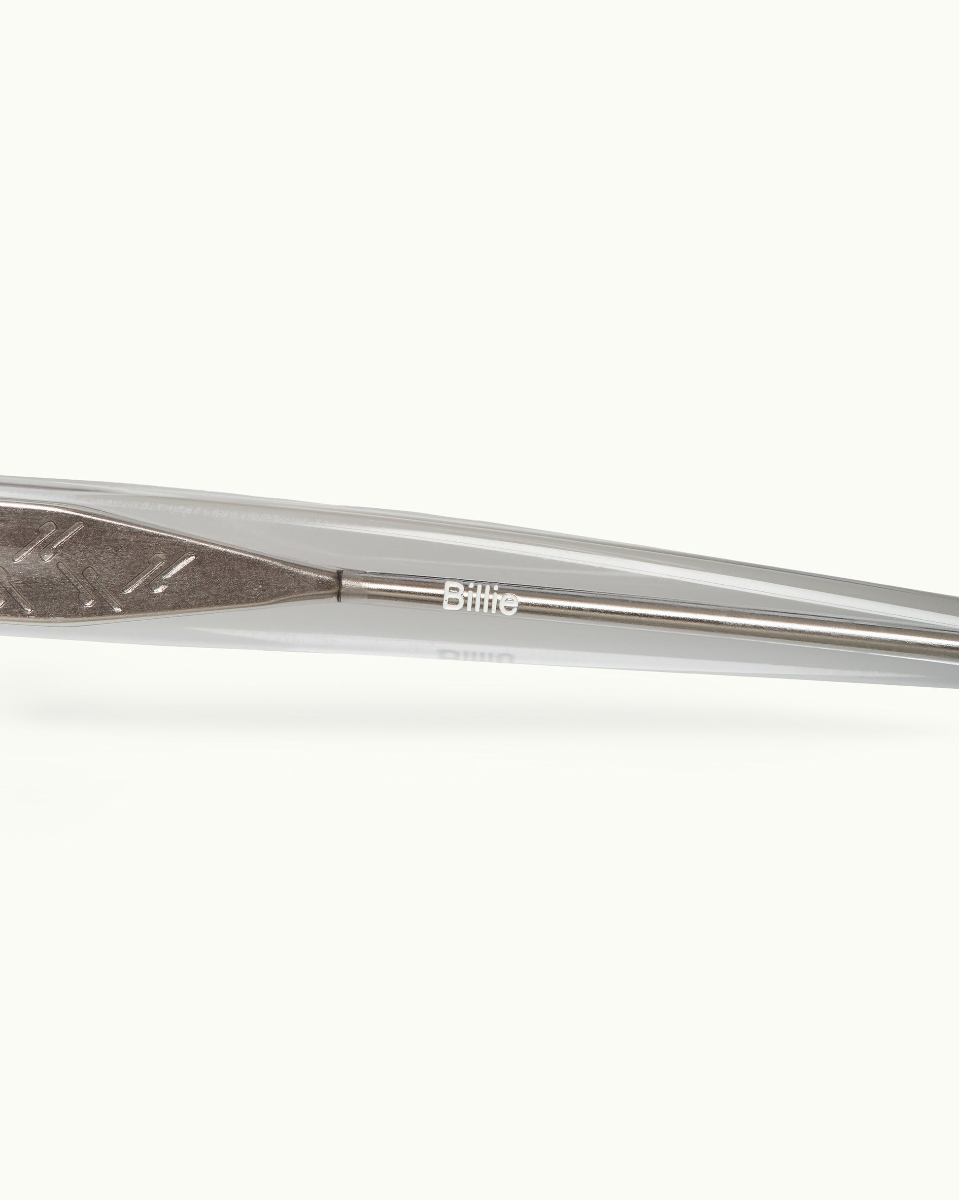 Metallic sunlasses arm on a white background