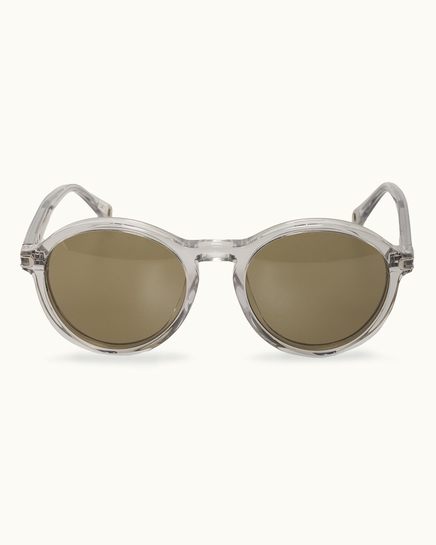 Round sunglasses with transparent frame and brown lenses on a white background