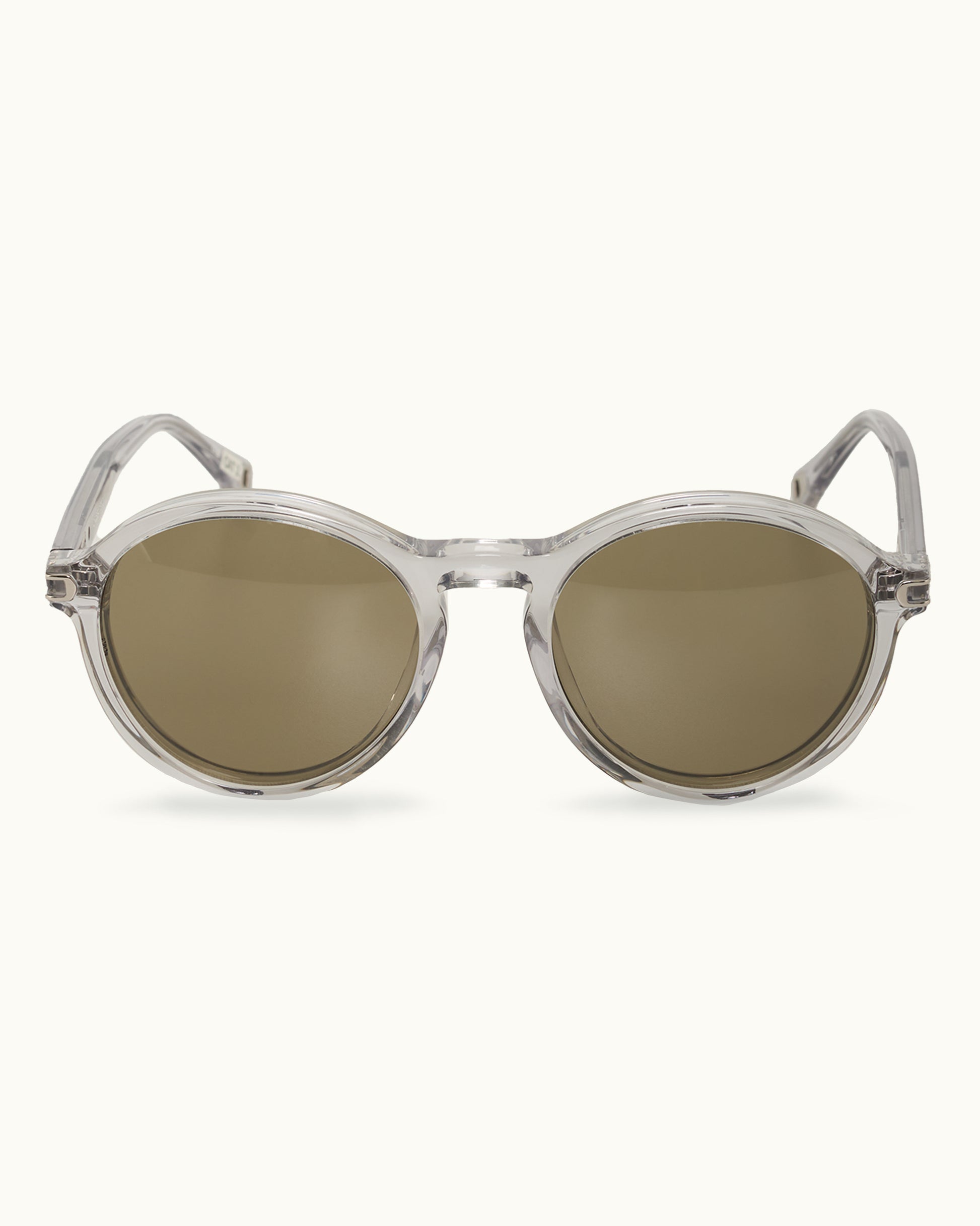 Round sunglasses with transparent frame and brown lenses on a white background