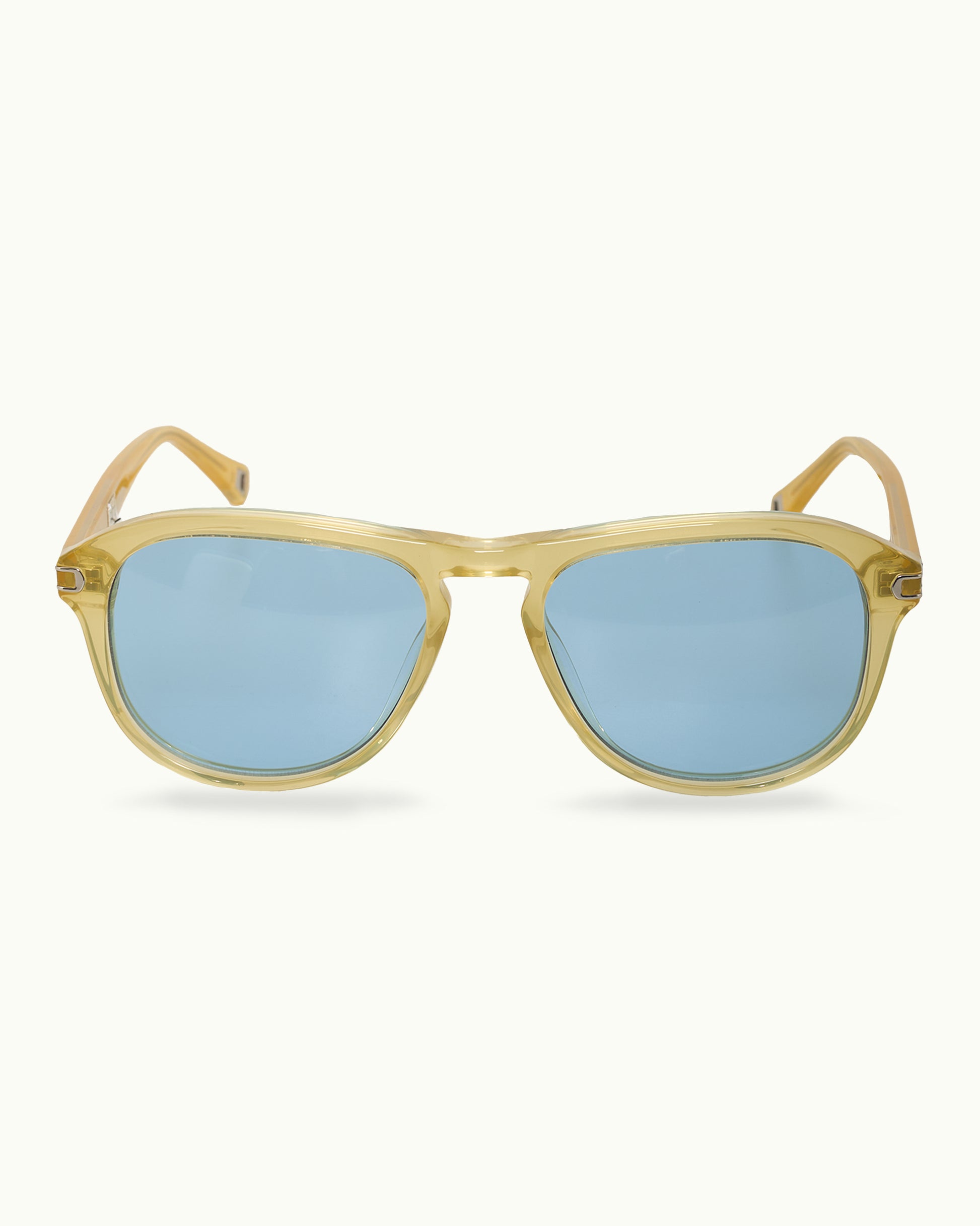 Gold-framed sunglasses with blue lenses on a white background