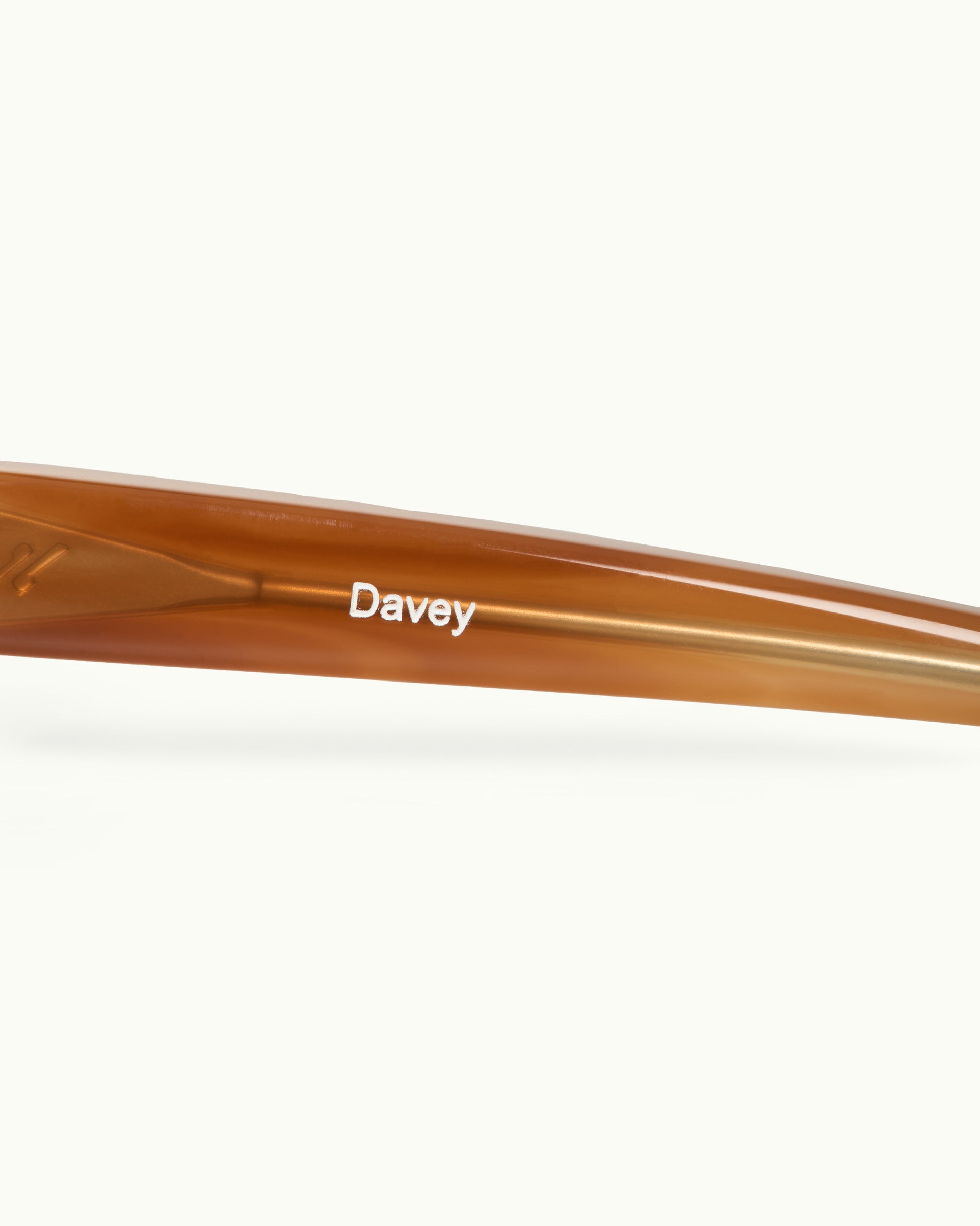 sunglasses arm with 'Davey' branding on a white background
