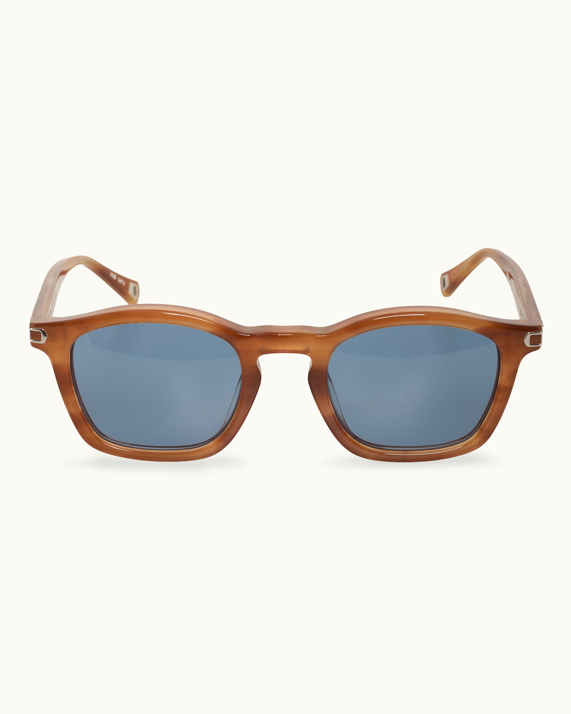 Brown sunglasses with blue lenses on a white background