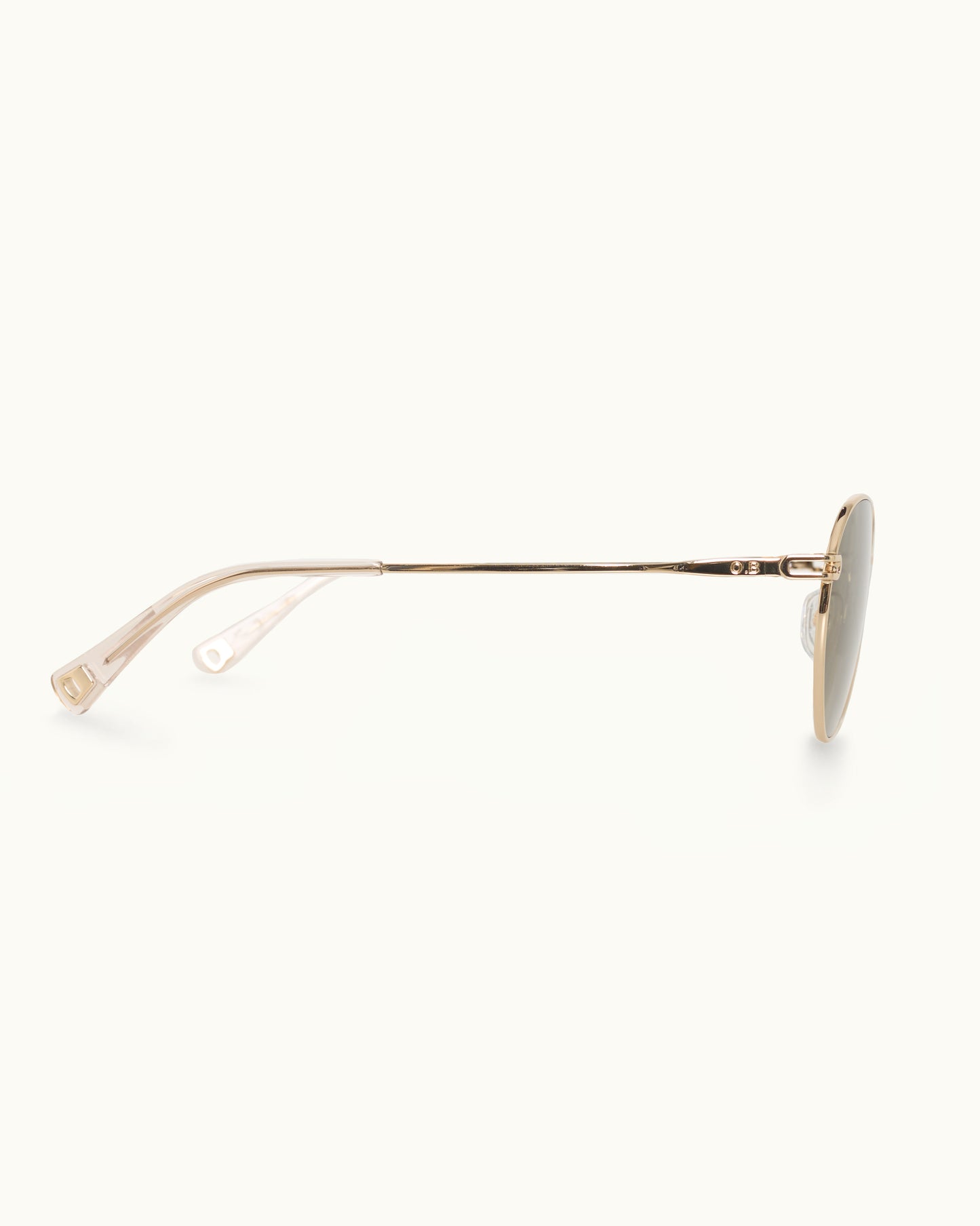 Gold-framed sunglasses on a white background