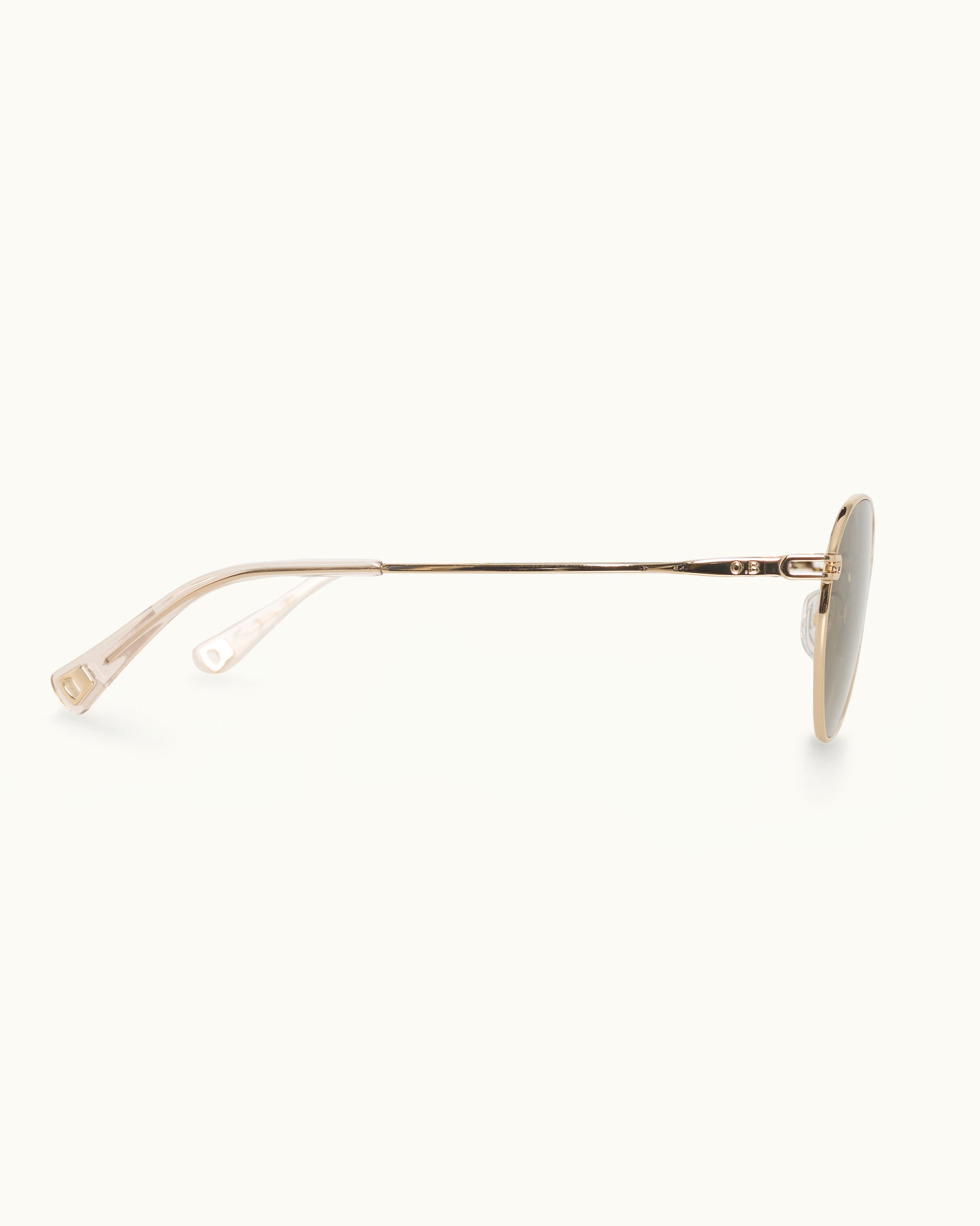 Gold-framed sunglasses on a white background