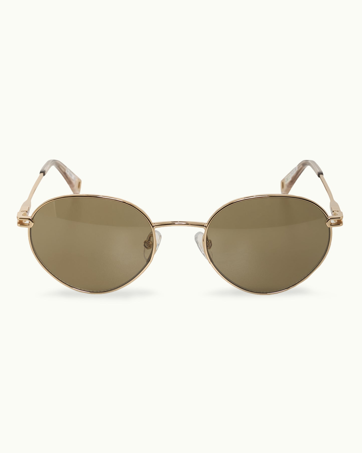 Gold-framed sunglasses with reflective lenses on a white background