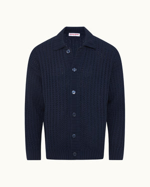 Navy blue textured cardigan on a white background