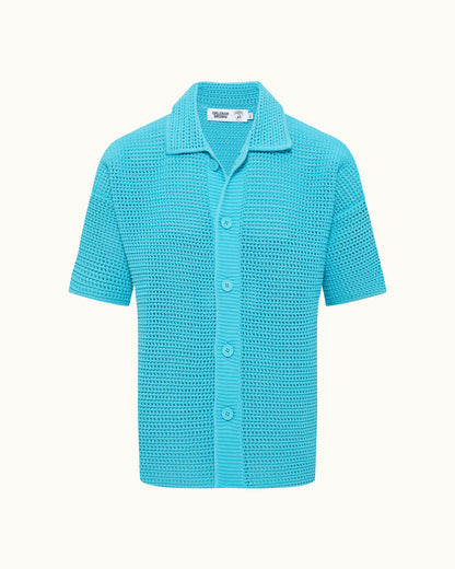 Blue textured short-sleeve shirt on a white background