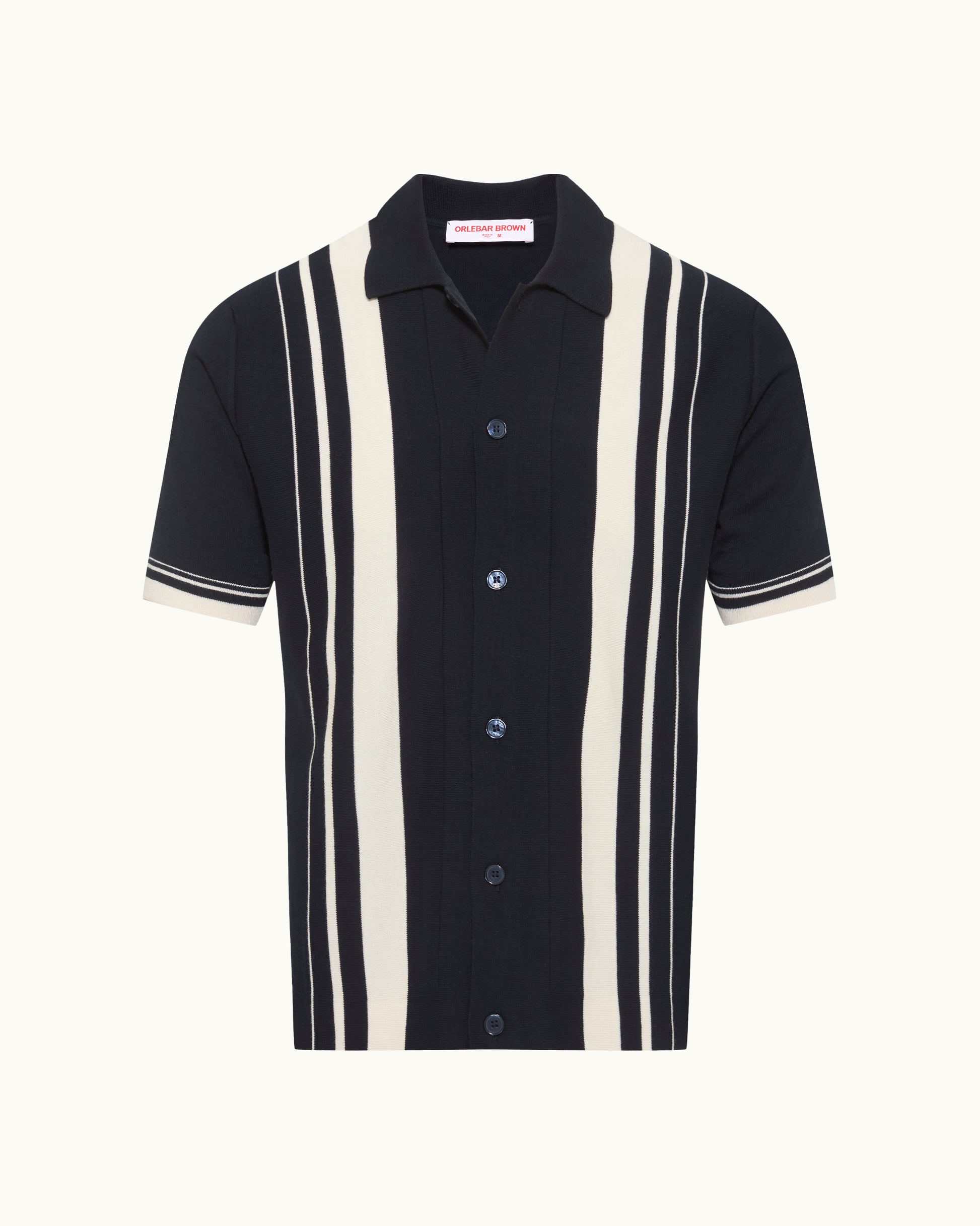 Black and white striped shirt with button details on a white background