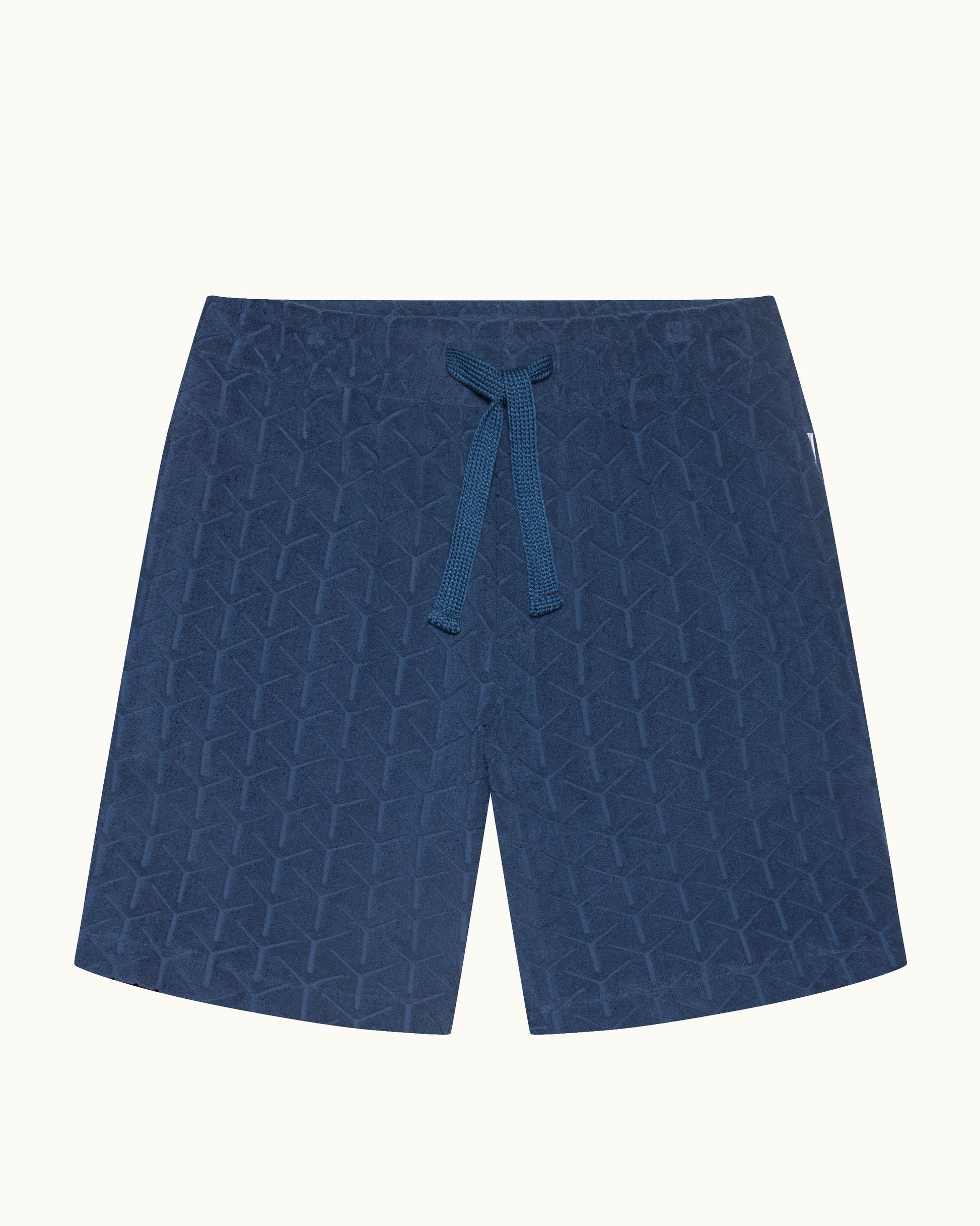 Blue shorts with a geometric pattern on a white background