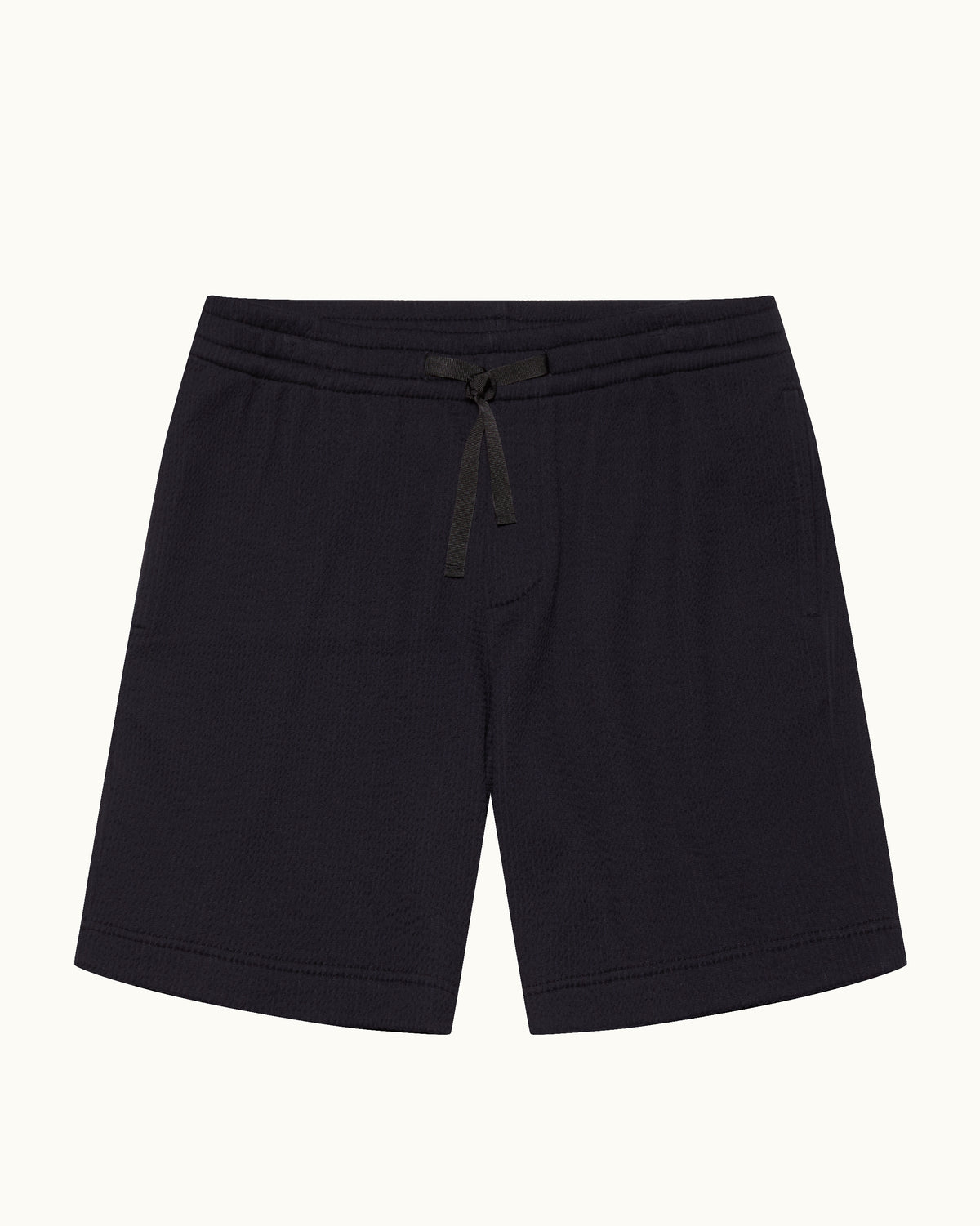 Navy towelling sweat shorts with drawstring waist on a plain background
