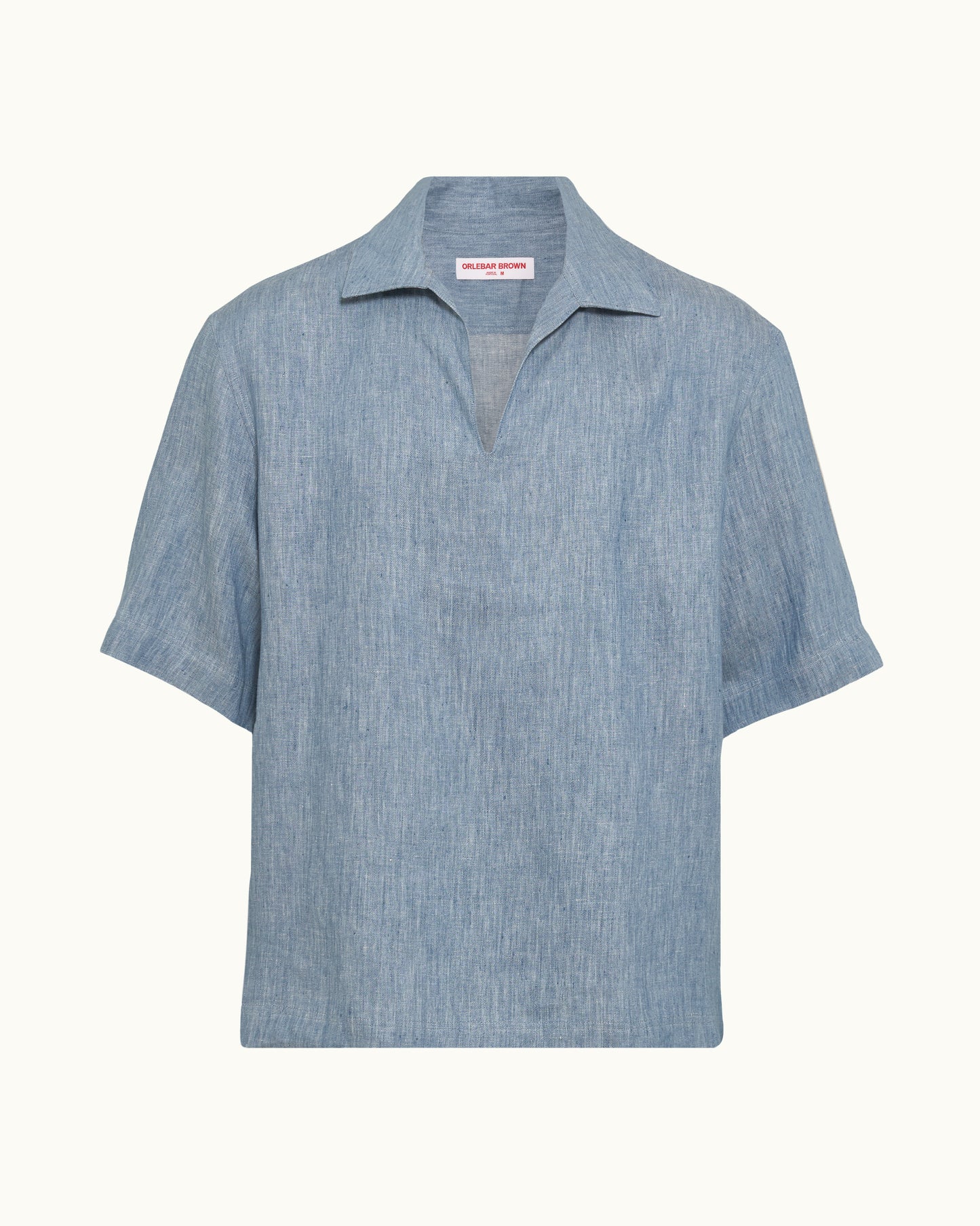 Blue short sleeve shirt on a plain background