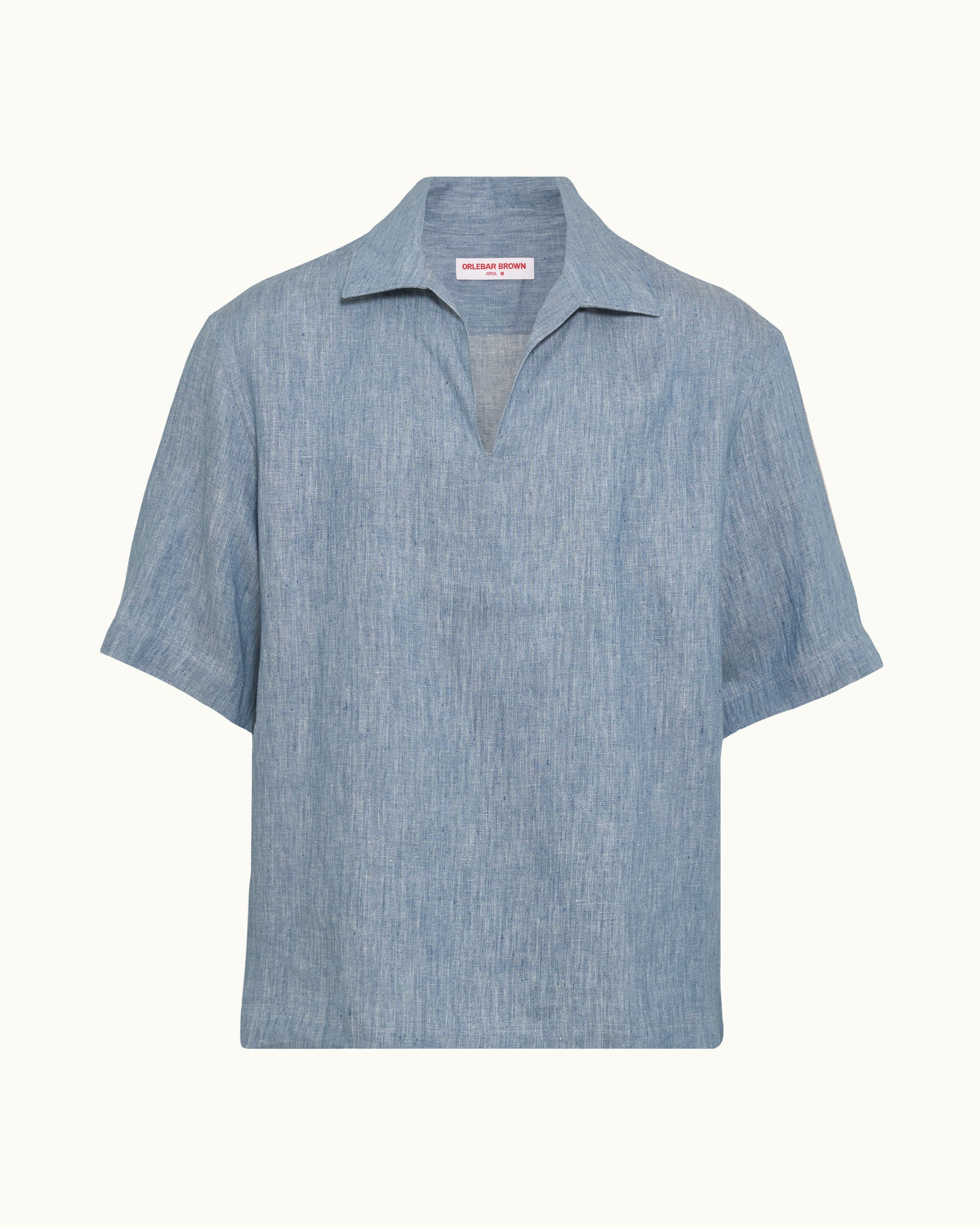Blue short sleeve shirt on a plain background