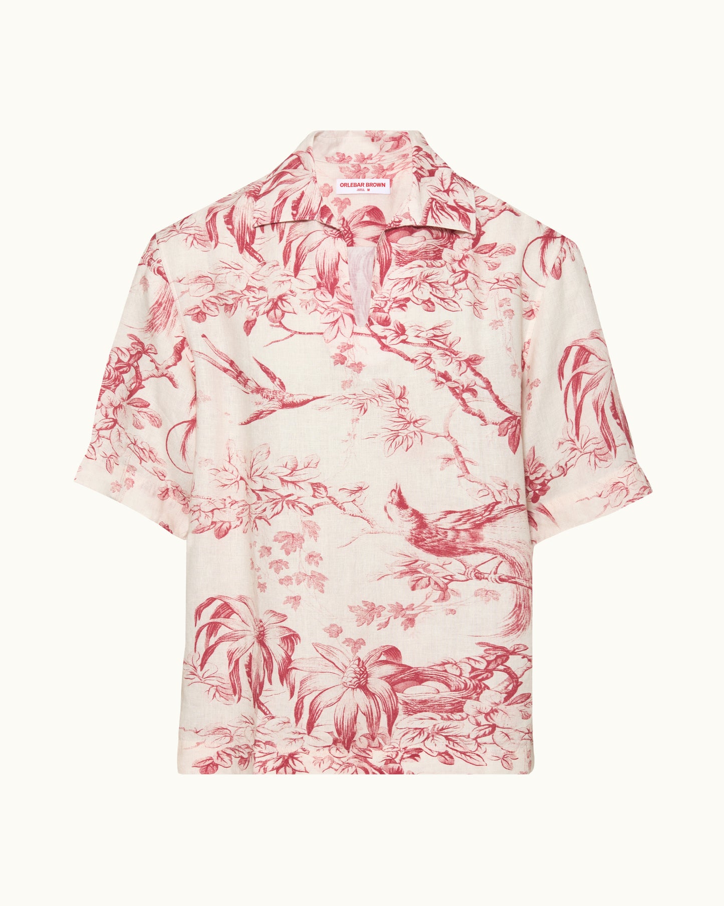 Pink floral patterned shirt on a white background
