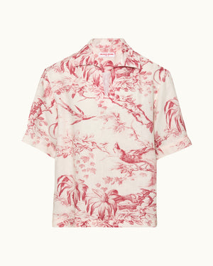 Pink floral patterned shirt on a white background